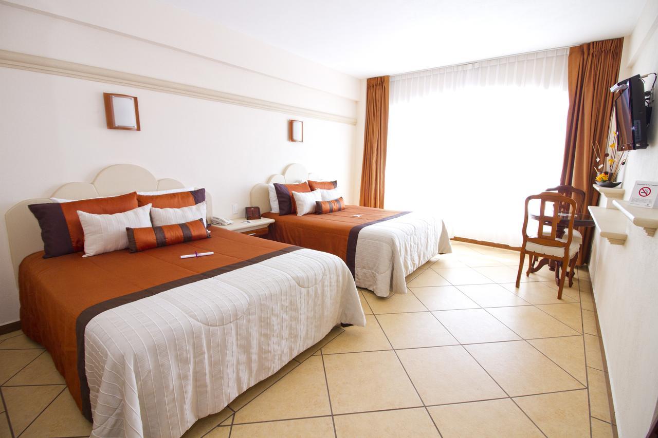 Hotel 9 Manantiales Чигнауапан Екстериор снимка