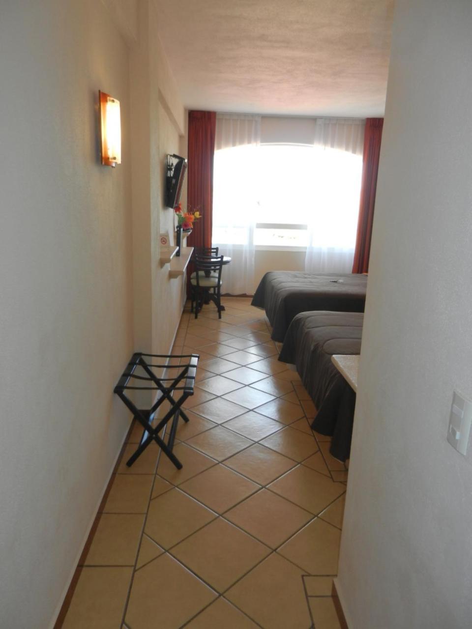 Hotel 9 Manantiales Чигнауапан Екстериор снимка