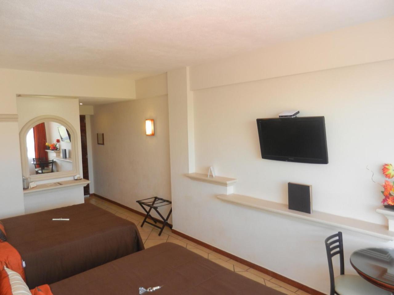 Hotel 9 Manantiales Чигнауапан Екстериор снимка