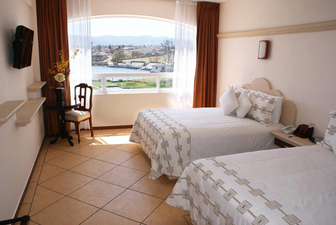 Hotel 9 Manantiales Чигнауапан Екстериор снимка