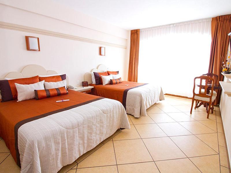 Hotel 9 Manantiales Чигнауапан Екстериор снимка