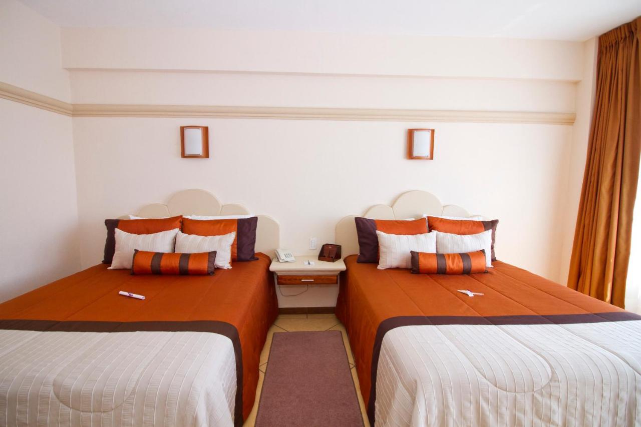 Hotel 9 Manantiales Чигнауапан Екстериор снимка