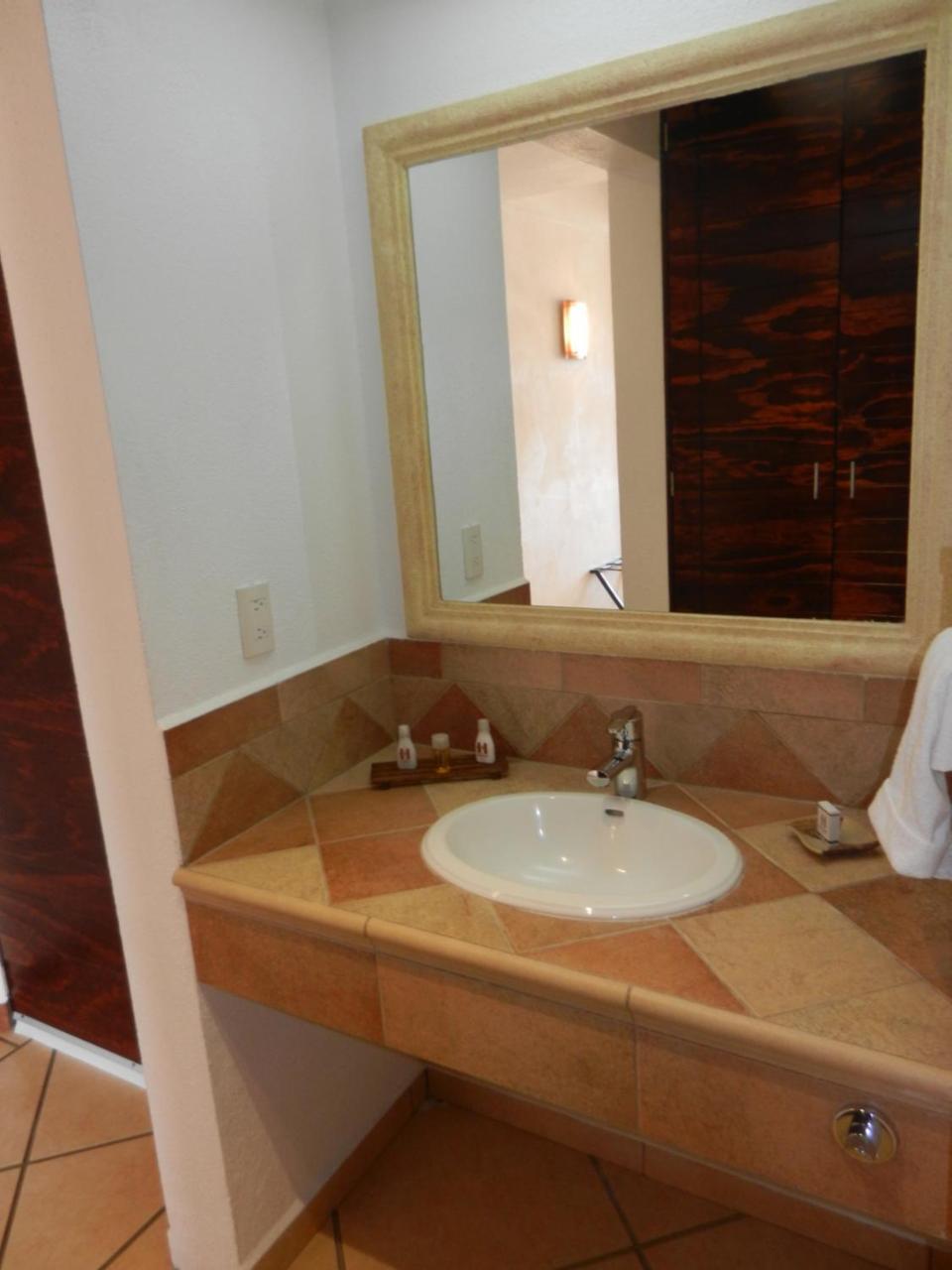 Hotel 9 Manantiales Чигнауапан Екстериор снимка