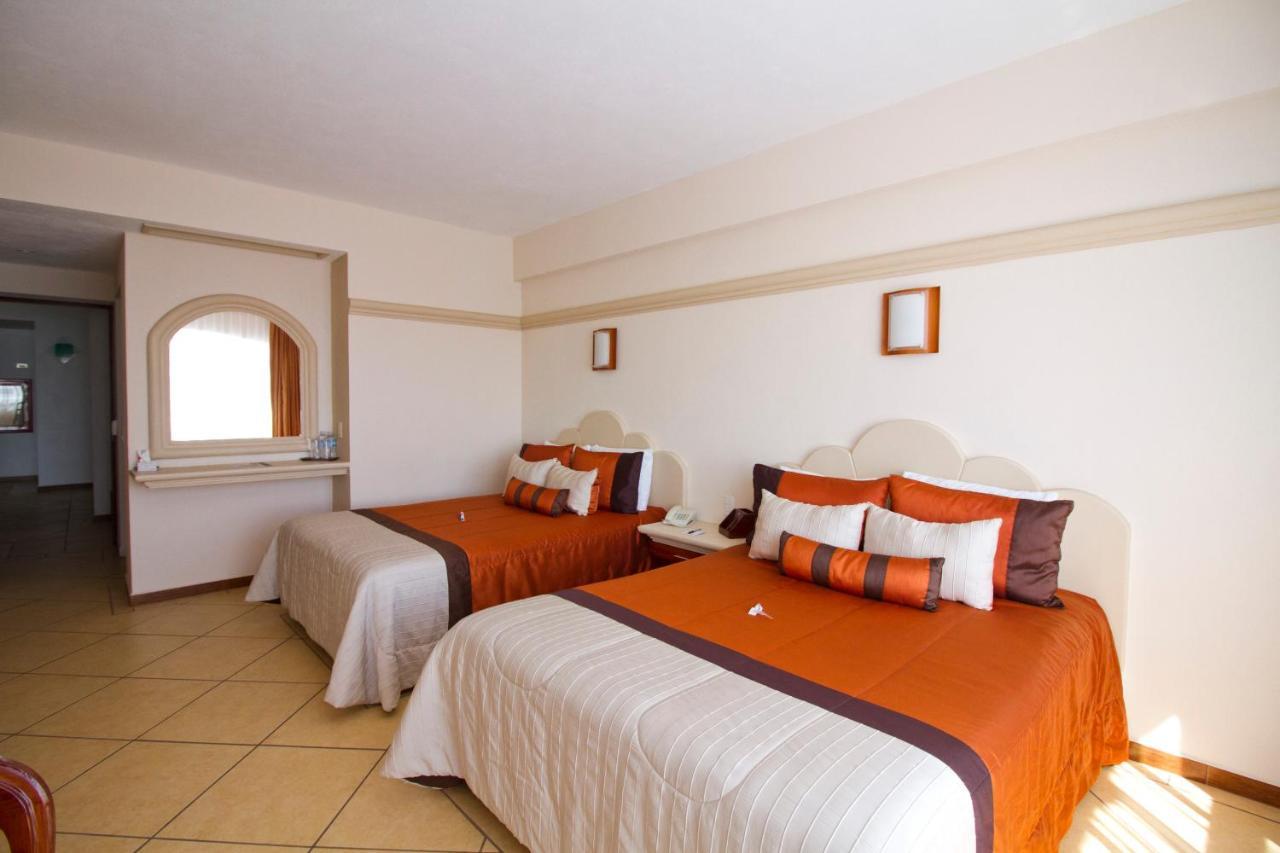 Hotel 9 Manantiales Чигнауапан Екстериор снимка