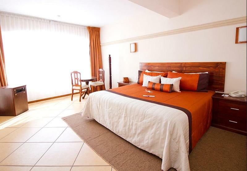 Hotel 9 Manantiales Чигнауапан Екстериор снимка