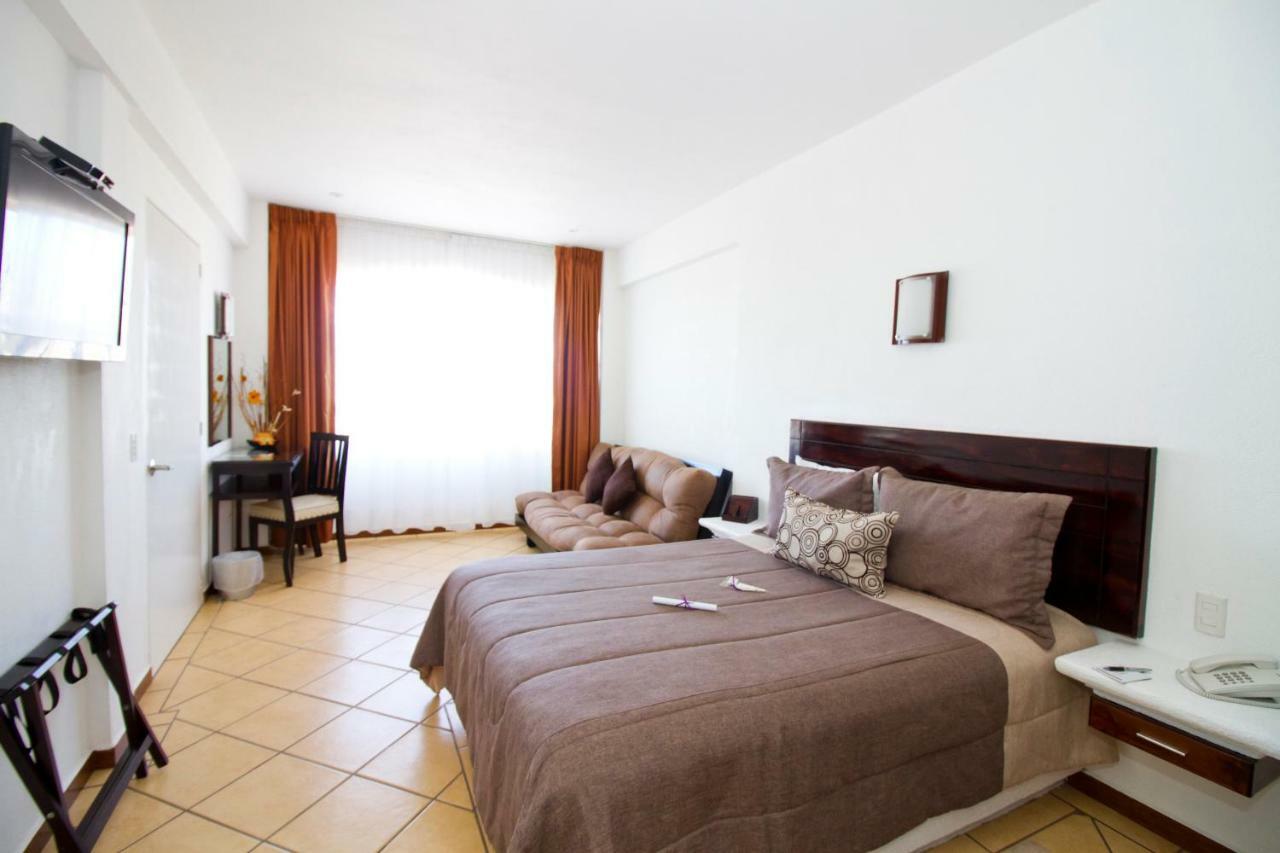 Hotel 9 Manantiales Чигнауапан Екстериор снимка