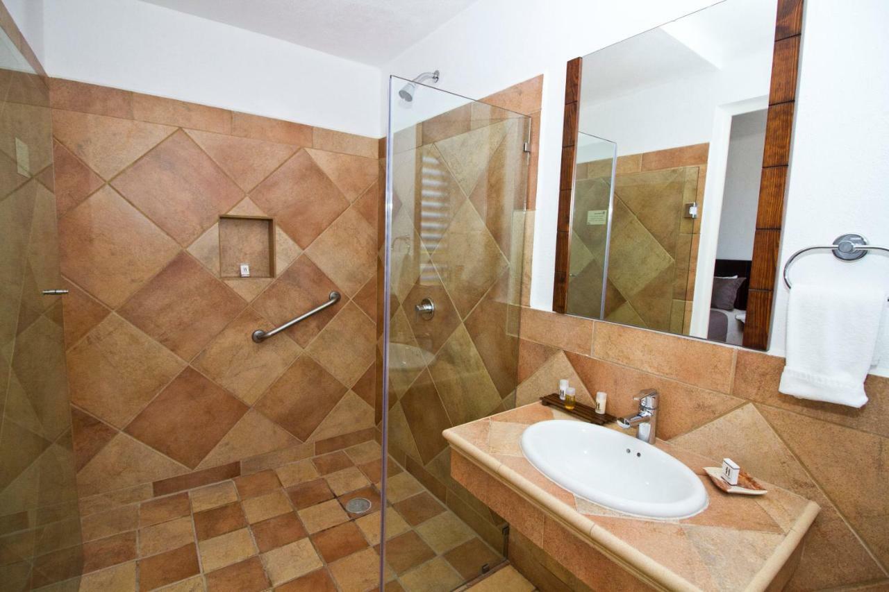 Hotel 9 Manantiales Чигнауапан Екстериор снимка